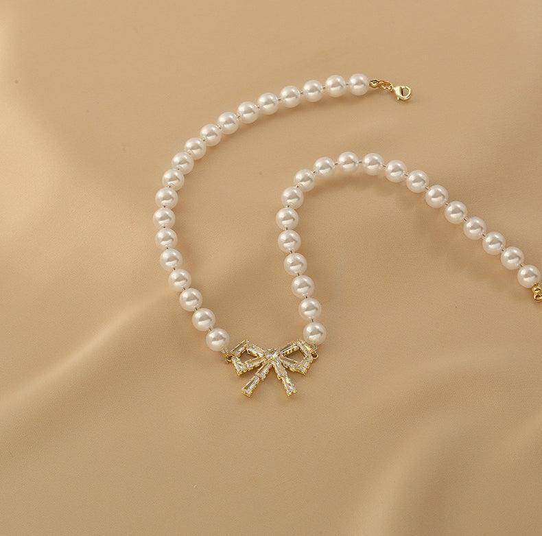 Ladies Lux Fake Pearl Bowknot Necklace SKAJ015 - SWEETKAMA