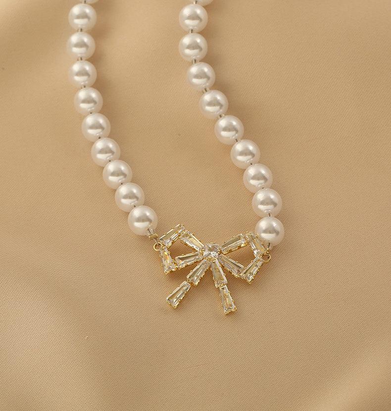 Ladies Lux Fake Pearl Bowknot Necklace SKAJ015 - SWEETKAMA