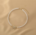 Ladies Lux Fake Pearl Bowknot Necklace SKAJ015 - SWEETKAMA